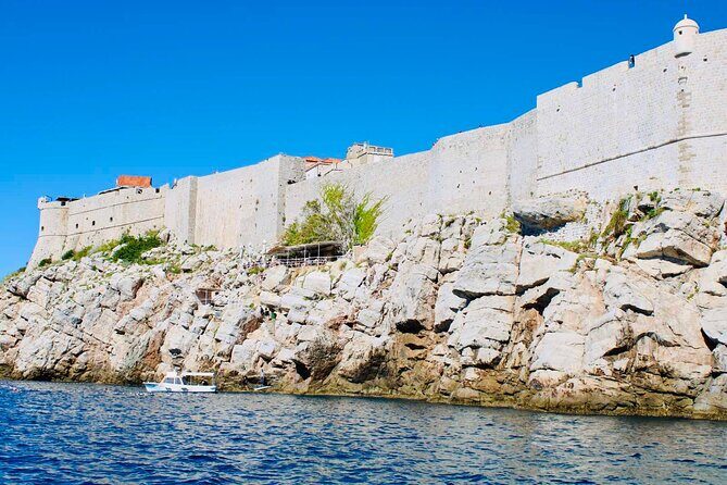 Dubrovnik Boat Tour: Lokrum Island, Betina Cave & St.Jacobs Beach - Footwear, waves, and crowding: how to make the rocky stops work for you
