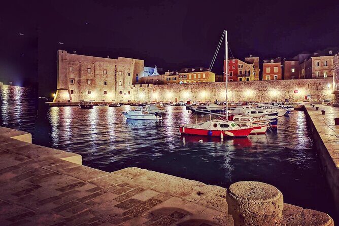 Dubrovnik By Night Walking Tour - Franciscan Church and Monastery area: pharmacy and water stories