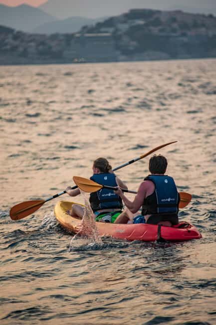 Dubrovnik: Sunset Kayaking and Snorkeling Tour - Wine onshore: a calm landing after you’ve worked for it